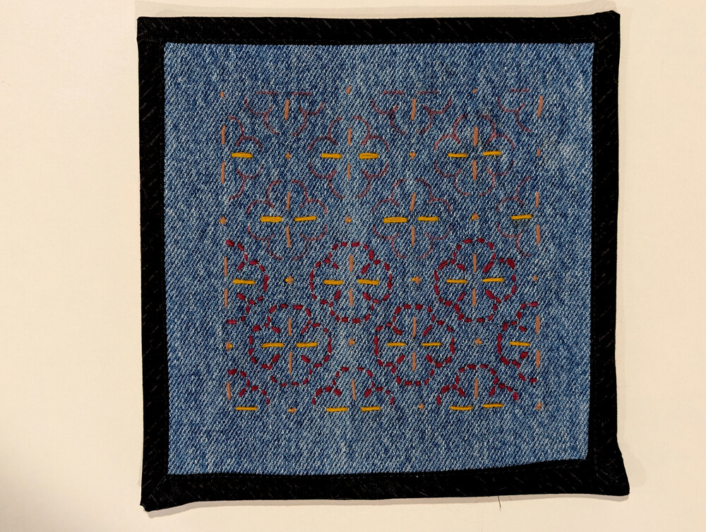 Sashiko sample showing the cherry grid pattern