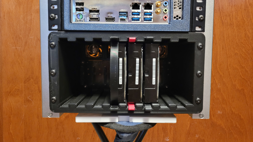 Enclosure installed in a mini rack