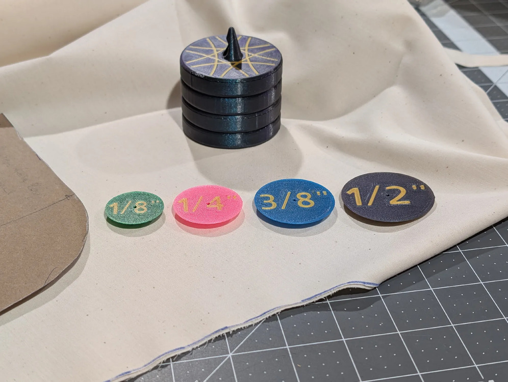 Seam allowance discs labeled 1/8 inch through 1/2 inch