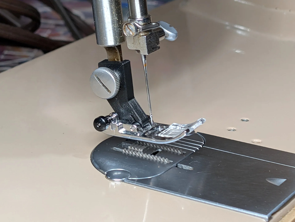 Modern clip-on foot attached via the adapter