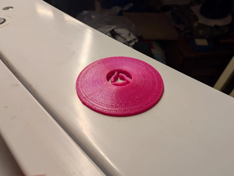 Spool pin cap, top view